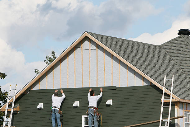 Professional Storm Damage Siding Repair technician working in New Market, MD